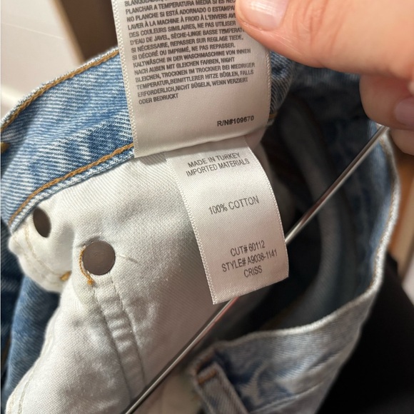 AGOLDE Criss Cross Symbol Medium Indigo Wash Asymmetrical Cutoff Jean Shorts - Picture 11 of 11